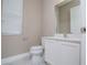 Modern bathroom features a sleek vanity and fixtures at 1430 Reunion Blvd, Reunion, FL 34747