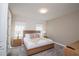 Cozy bedroom with natural light, offering a peaceful retreat for rest and relaxation at 1430 Reunion Blvd, Reunion, FL 34747