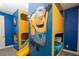 Spacious bedroom showcasing playful minion themed custom bunk beds at 1430 Reunion Blvd, Reunion, FL 34747