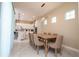 Open dining area next to a modern kitchen, perfect for entertaining at 1430 Reunion Blvd, Reunion, FL 34747