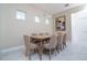 Inviting dining room with natural light and stylish decor at 1430 Reunion Blvd, Reunion, FL 34747