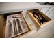 Organized kitchen drawers with silverware and utensils neatly arranged in dividers at 1430 Reunion Blvd, Reunion, FL 34747