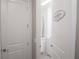 A bright, clean laundry room featuring modern appliances and ample storage space at 1430 Reunion Blvd, Reunion, FL 34747