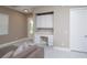 Inviting living room features built-in desk, and seamless access to the outdoor area at 1430 Reunion Blvd, Reunion, FL 34747