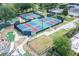 Overhead view of pickleball courts and mini golf, complete with recreational facilities and well-maintained grounds at 1430 Reunion Blvd, Reunion, FL 34747