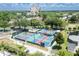 Aerial shot of well-maintained pickleball courts and recreational areas, ideal for active lifestyles at 1430 Reunion Blvd, Reunion, FL 34747