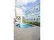 Private pool surrounded by well-maintained landscaping, offering a serene outdoor retreat at 1430 Reunion Blvd, Reunion, FL 34747