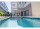 Private pool view, with sliding glass doors leading to the interior living space at 1430 Reunion Blvd, Reunion, FL 34747