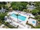 Inviting swimming pool with lounge chairs and lush landscaping, perfect for relaxation and recreation at 1430 Reunion Blvd, Reunion, FL 34747