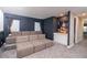 Inviting home theater with tiered seating, offering an immersive viewing experience for movies and entertainment at 1430 Reunion Blvd, Reunion, FL 34747