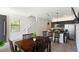 Dining area and kitchen with modern finishes and an inviting atmosphere, perfect for everyday living at 3428 Tranquil Trail, Kissimmee, FL 34747