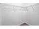 Empty walk-in closet with wire shelving, offering practical storage solutions at 3428 Tranquil Trail, Kissimmee, FL 34747