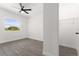 Bright bedroom with tile floors, closet and a window offering outdoor views at 4116 Winona Dr, Orlando, FL 32812