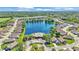 Aerial view of Lake James community with large lake and community pool at 7890 Lake James Blvd, Lakeland, FL 33810