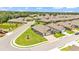 A beautiful home and community, showcasing the home's well-manicured landscaping and proximity to neighborhood amenities at 7890 Lake James Blvd, Lakeland, FL 33810