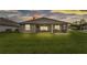 Well-maintained backyard with green grass and screened lanai, perfect for outdoor living at 7890 Lake James Blvd, Lakeland, FL 33810