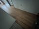 Damaged wood flooring shows separation, and walls show signs of needing repair and cleaning at 801 Quintilian Ave, Orlando, FL 32809