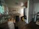 Functional kitchen with wooden cabinets, and tile floor at 801 Quintilian Ave, Orlando, FL 32809
