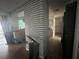 Open floor plan with kitchen view from the living area at 801 Quintilian Ave, Orlando, FL 32809