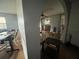 Open floor plan with living room flowing into kitchen through arched doorway at 801 Quintilian Ave, Orlando, FL 32809
