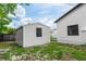 A cozy backyard featuring a storage shed on a lot with sparse vegetation at 1161 Orangewood Ave, Deland, FL 32724