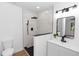 Modern bathroom features a walk-in shower with stylish tile, updated vanity, and contemporary fixtures at 1161 Orangewood Ave, Deland, FL 32724