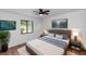 Comfortable main bedroom suite with modern ceiling fan and stylish decor at 1161 Orangewood Ave, Deland, FL 32724