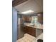 Traditional kitchen featuring stainless steel appliances and cabinetry at 2220 Woods Trl, Lakeland, FL 33809