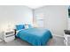 Comfortable bedroom featuring a queen-sized bed, two white nightstands, and carpeted floors at 229 St Thomas Dr, Mulberry, FL 33860
