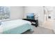 Comfortable bedroom with a TV and a window with bright daylight at 229 St Thomas Dr, Mulberry, FL 33860