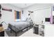 Cozy bedroom featuring a bed, desk and ample closet space at 229 St Thomas Dr, Mulberry, FL 33860