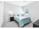 Cozy bedroom with a ceiling fan, a window, and carpeted floors at 229 St Thomas Dr, Mulberry, FL 33860