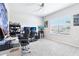 Bright office space with a large window and dual monitor setup at 229 St Thomas Dr, Mulberry, FL 33860