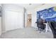 Spacious office area featuring an open door and large closet at 229 St Thomas Dr, Mulberry, FL 33860