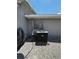 Outdoor AC unit with hose and satellite dish at 938 Oxford Way, Lake Wales, FL 33853
