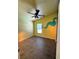 Bedroom featuring tile flooring, and bright yellow walls at 938 Oxford Way, Lake Wales, FL 33853