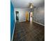 Spacious bedroom with neutral tones, ceiling fan, and tile flooring at 938 Oxford Way, Lake Wales, FL 33853
