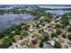 An elevated view showcases the community's homes alongside a large lake, enhancing the area's natural beauty at 212 Overlook Dr, Winter Haven, FL 33884