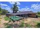 Backyard featuring a screened-in pool at 212 Overlook Dr, Winter Haven, FL 33884