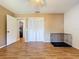 Bedroom featuring ceiling fan, and spacious closet with hardwood floors throughout at 212 Overlook Dr, Winter Haven, FL 33884