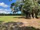 Picturesque lot featuring mature trees with Spanish moss and ample shade at 2748 Cr 543, Sumterville, FL 33585