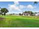 Huge grassy backyard for recreation and relaxation at 413 Bay Leaf Dr, Poinciana, FL 34759