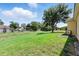 Expansive backyard offers plenty of green space at 413 Bay Leaf Dr, Poinciana, FL 34759