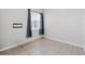 Neutral bedroom with window, tile floor, and minimal decor at 413 Bay Leaf Dr, Poinciana, FL 34759
