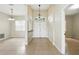 Welcoming entryway featuring neutral paint, and tile flooring, leading to a light and airy living space at 413 Bay Leaf Dr, Poinciana, FL 34759
