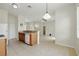 Open-concept floor plan with tile flooring connecting kitchen and living area at 413 Bay Leaf Dr, Poinciana, FL 34759
