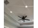 Modern ceiling with fan, recessed lighting, and tray design elements at 112 Cr 532B, Bushnell, FL 33513