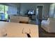 Bright, open living room with backyard views at 112 Cr 532B, Bushnell, FL 33513