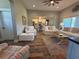 Spacious living room with lots of seating and hardwood flooring at 112 Cr 532B, Bushnell, FL 33513