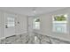 Neutral bedroom with white marble flooring at 390 Windermere Dr, Lakeland, FL 33809